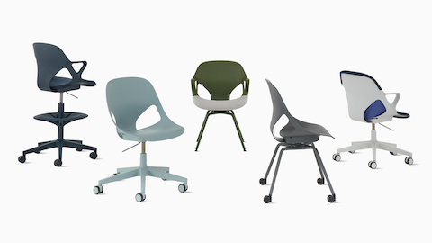 A collection of five chairs from the Zeph family, including a graphite side chair with casters, a glacier multipurpose chair, an alpine fixed arm mulitpurpose chair with a nightfall unibody cover, a nightfall stool with a nightfall seat pad, and an olive side chair with arms and an alpine seat pad