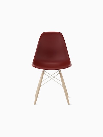 Red upholstered Eames Molded Plastic side chair with a wire base, viewed from a 45-degree angle.