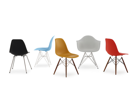 Five Eames Molded Plastic side and armchairs in white, brown, blue, red, and black, showing the various base options.