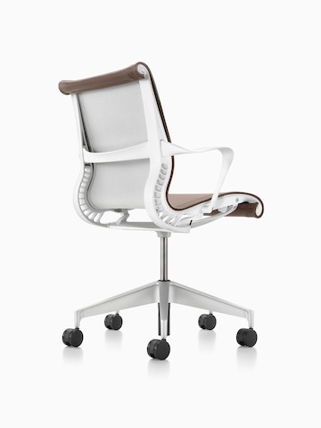 Light brown Setu office chair, viewed from the rear and side.
