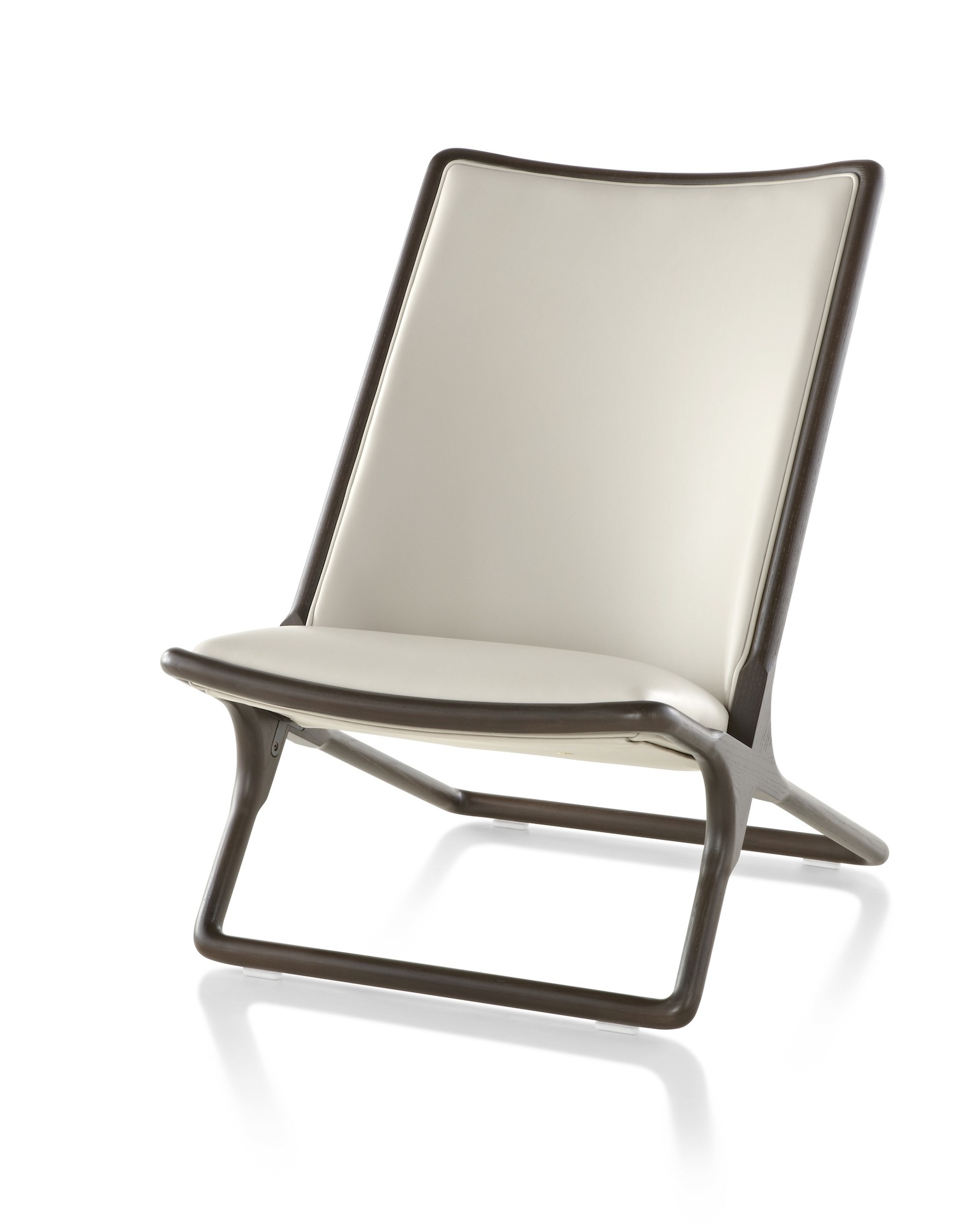 Angled view of a Scissor lounge chair with ivory-colored leather upholstery, showing the rectangular structure.