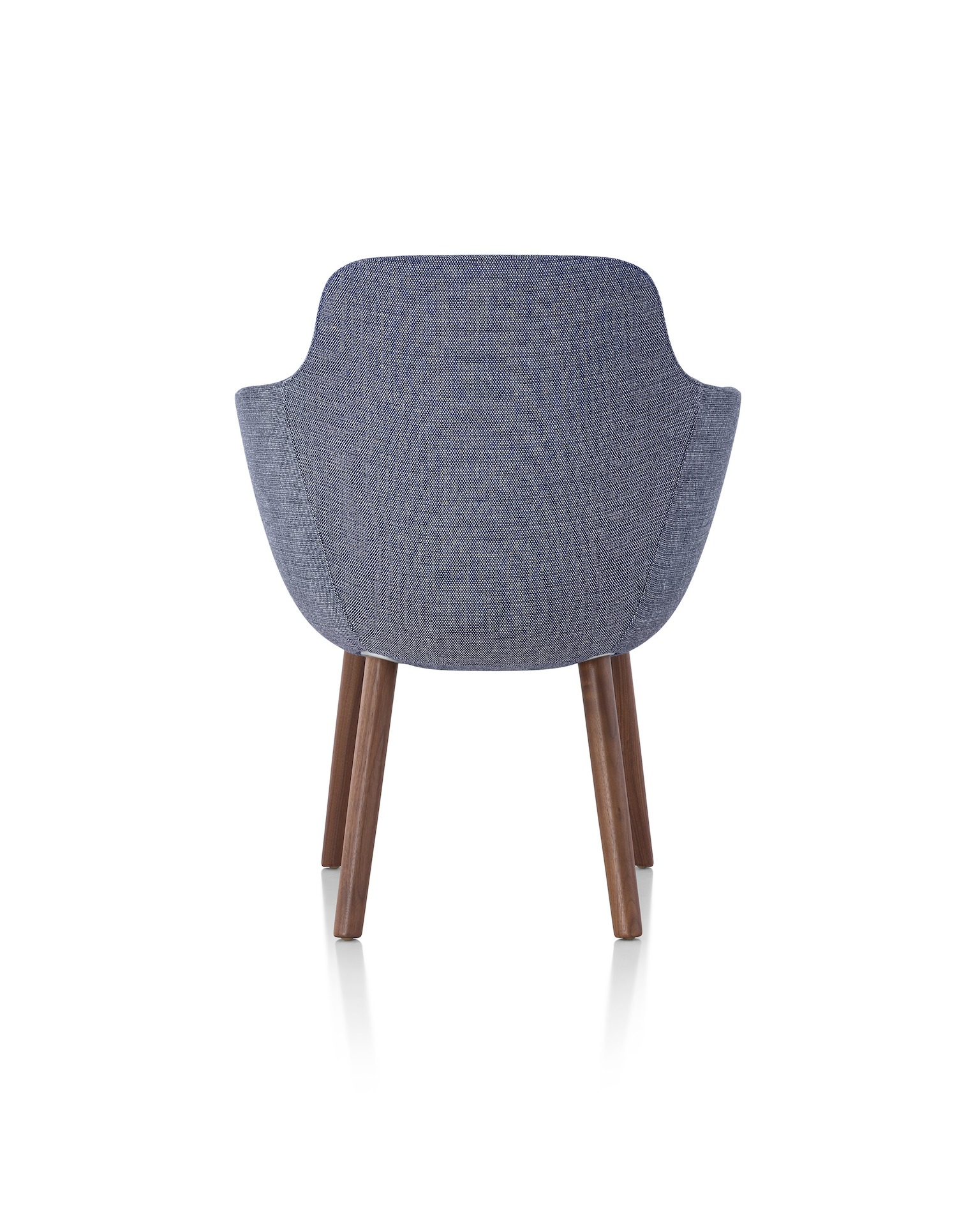 A Saiba Side Chair with blue upholstery and wood legs in a medium finish, viewed from behind.