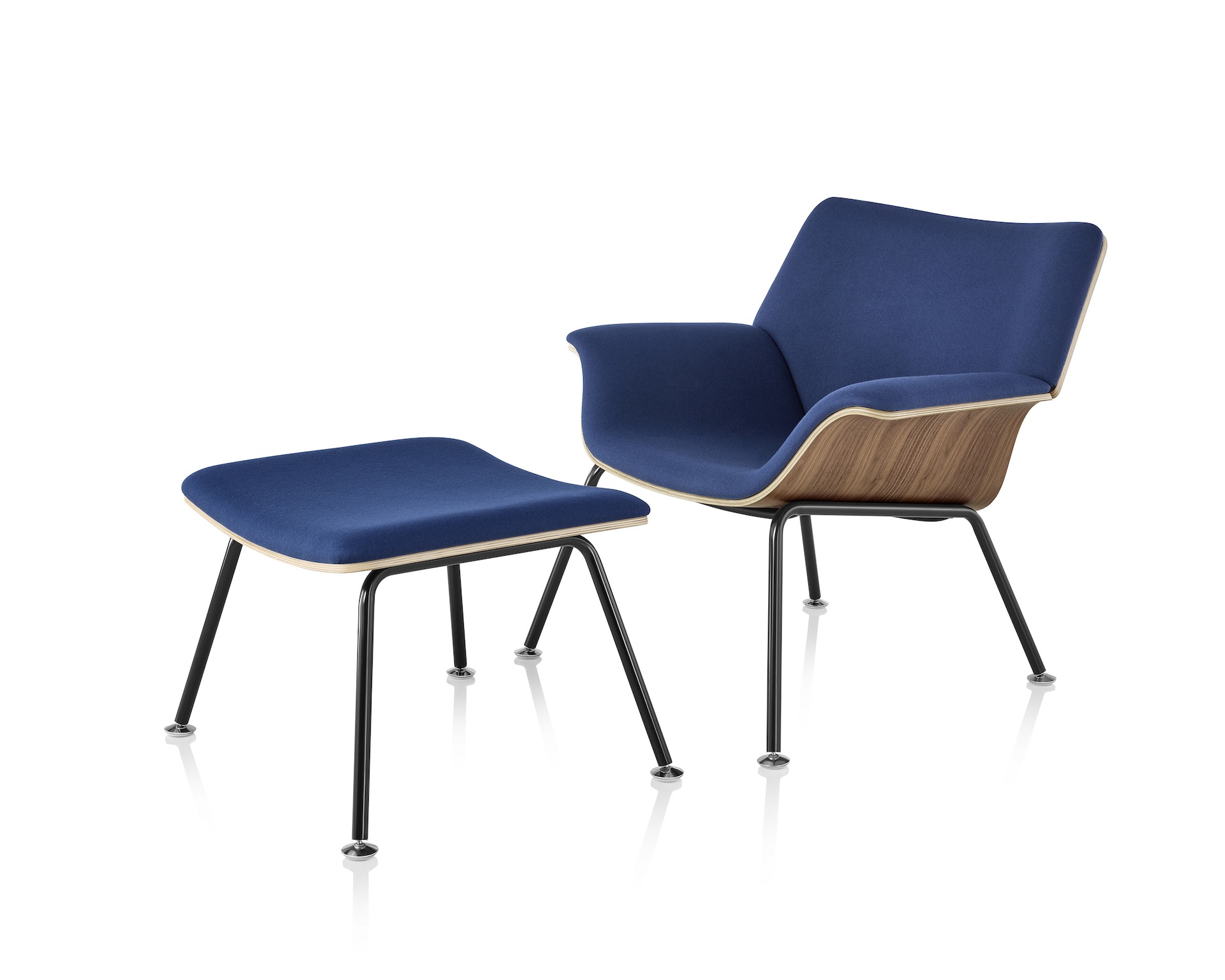 Swoop Plywood Lounge Chair and Ottoman with dark royal blue upholstery viewed from a 45-degree angle