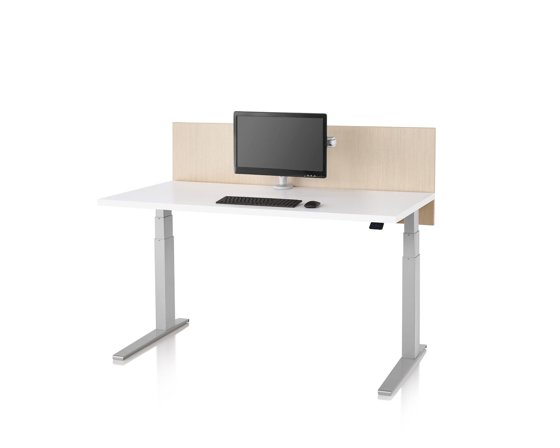 A tan laminate privacy screen installed on a Motia Sit-to-Stand Table that has a white top and silver legs.