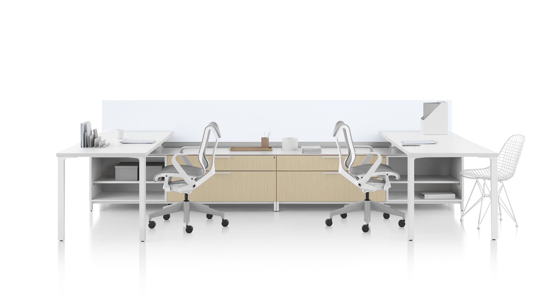 Canvas Dock workstation with white surface, glass screens, and light brown lower storage.