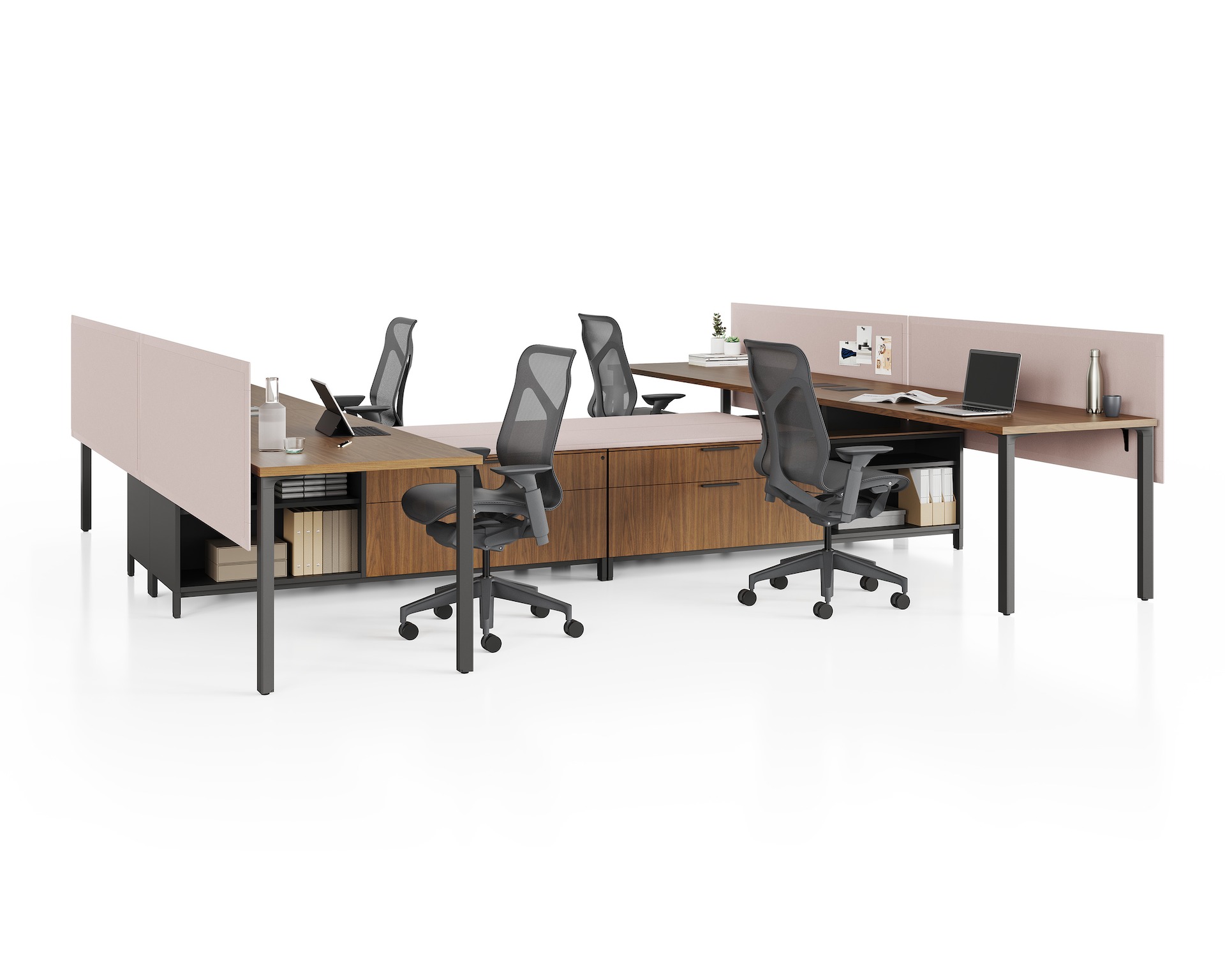Group of four Canvas Storage workstations with wood surfaces, pink screens, and black Cosm Chairs.