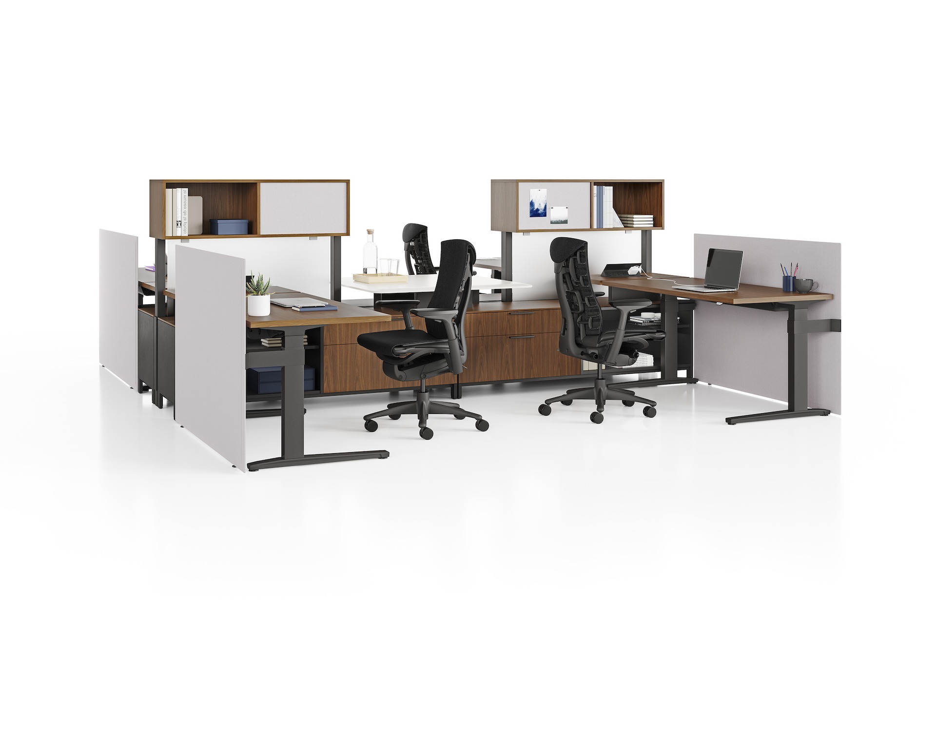 Canvas Dock workstations with sit-to-stand tables, storage, grey screens, and black Embody Chairs.