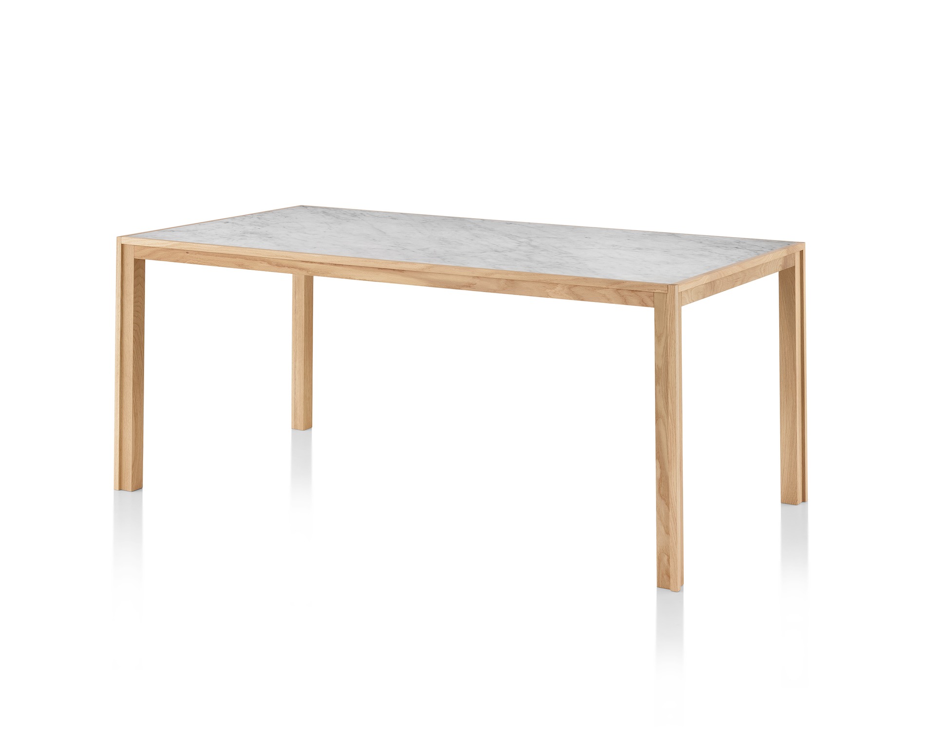 An oak Doubleframe Table featuring a Carrara marble top, viewed from an angle.