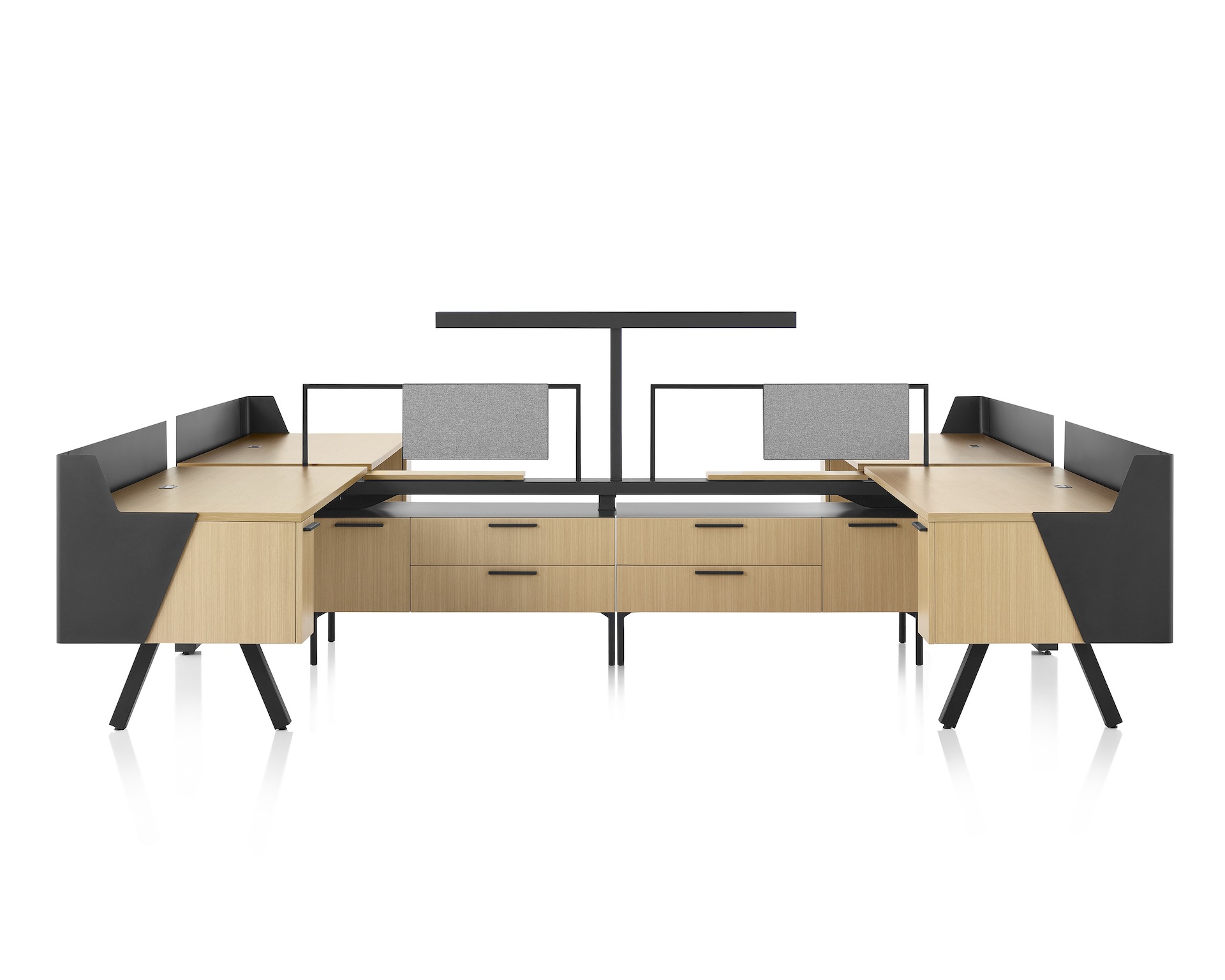 Brown and black Canvas Vista workstations with a-shaped legs, modesty and privacy screens and t-shaped light.