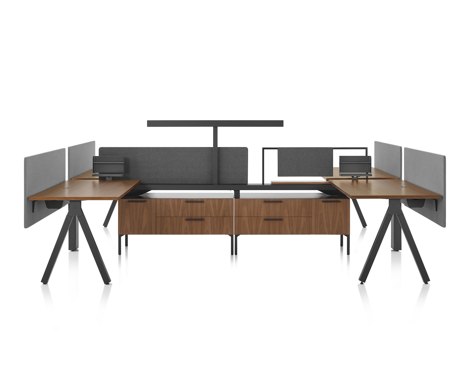 Brown and black Canvas Vista workstations with dark gray fabric screens and black t-shaped light.