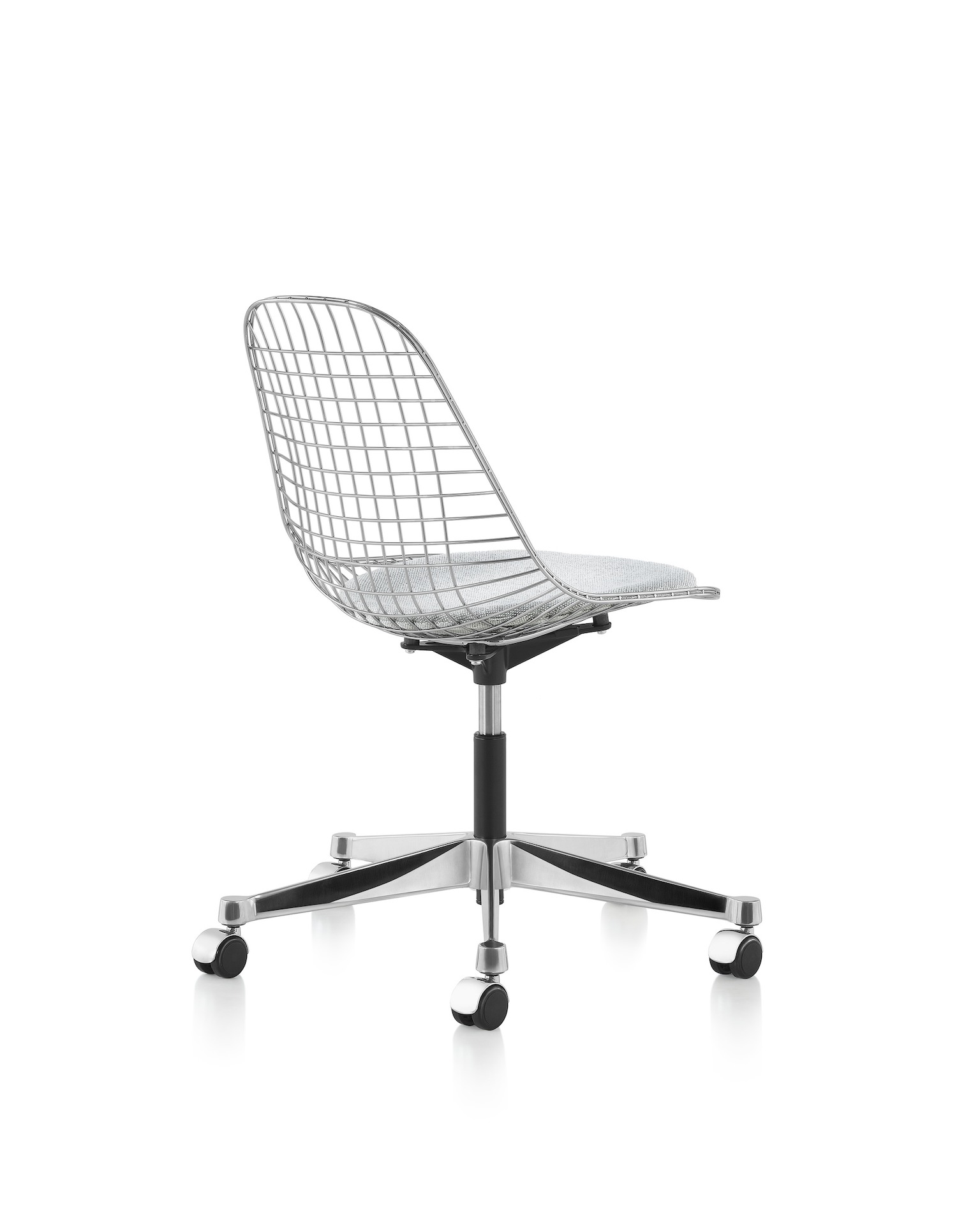 An Eames Wire Chair featuring a light gray seat textile, a five star base and casters. Viewed from behind at an angle.