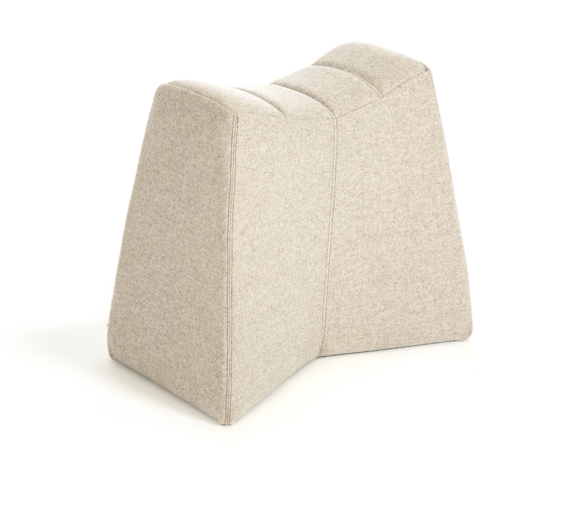 A tall beige naughtone Pinch Stool, viewed at an angle.