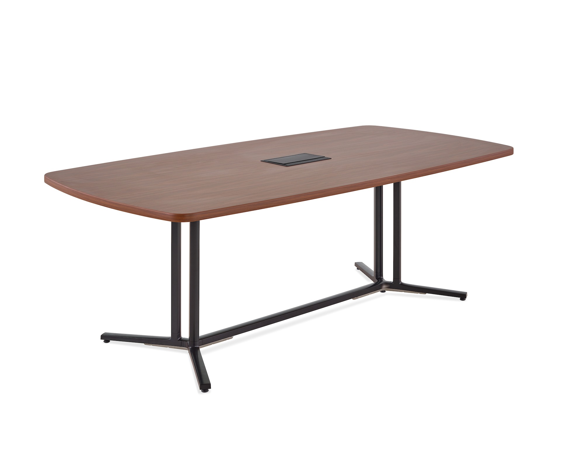 A square edge rectangular Everywhere conference table with a medium walnut woodgrain laminate top and central power access, viewed at an angle.