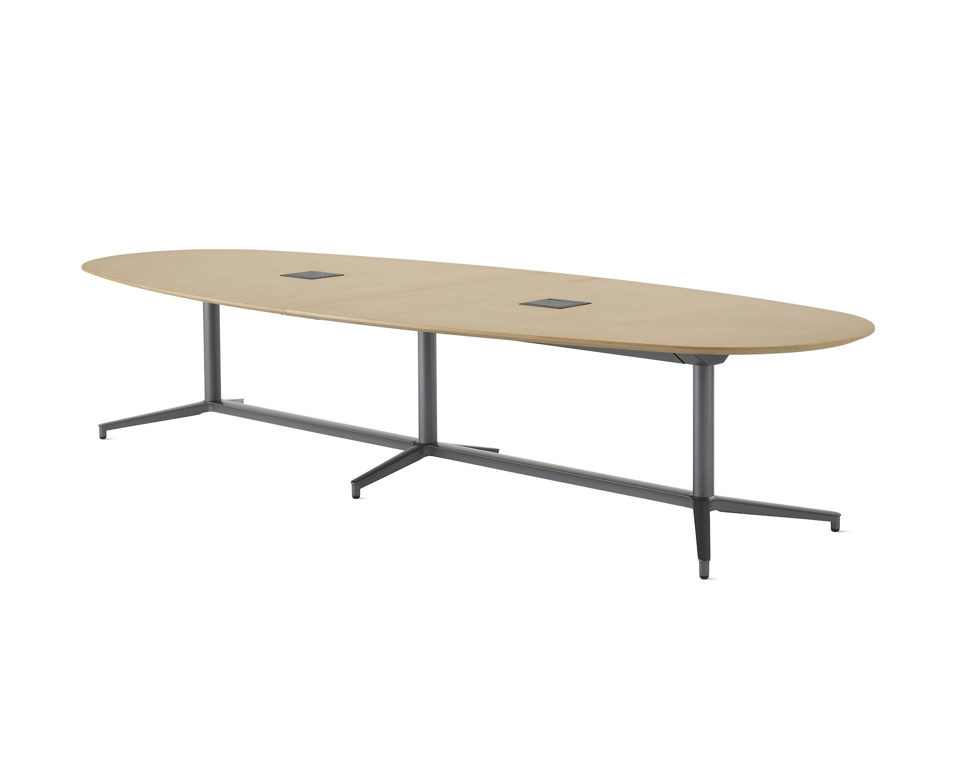 An oval Y base Headway conference table with a medium light wood top and dark gray base viewed at a 45-degree angle.