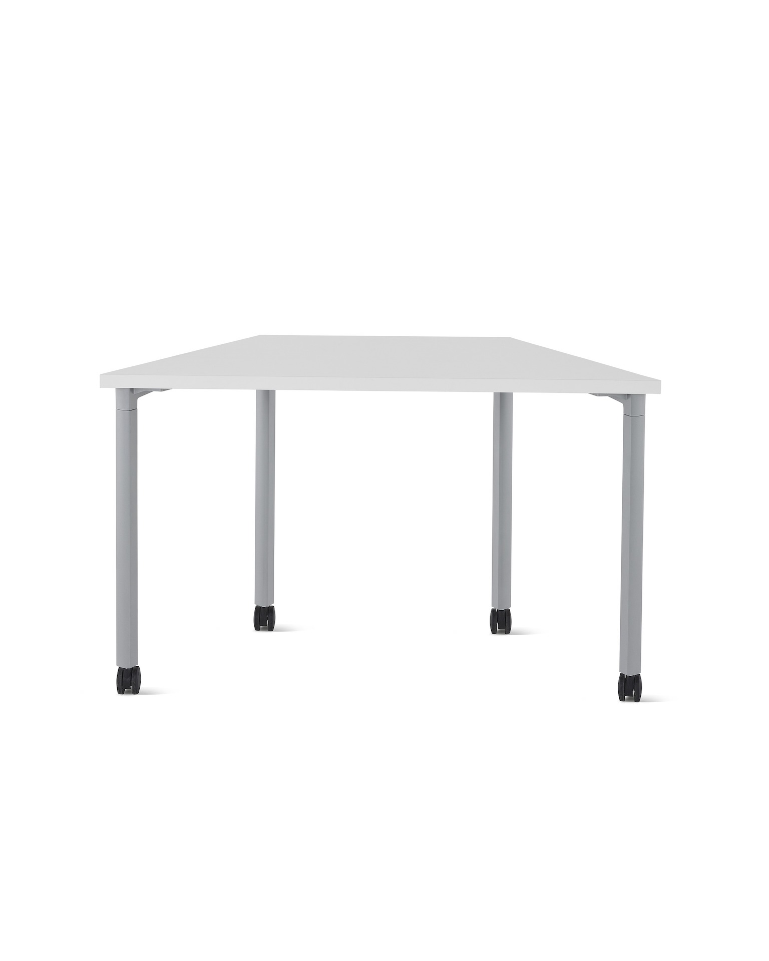 A trapezoid shaped Everywhere Table with white top and silver legs. 