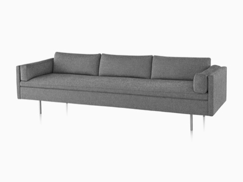 Gray three-seat Bolster Sofa, fiewed from the front at an angle.