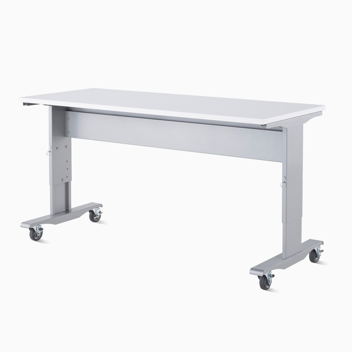 Detail of a Co/Struc System mobile and height-adjustable work process table with a silver frame and white top surface.