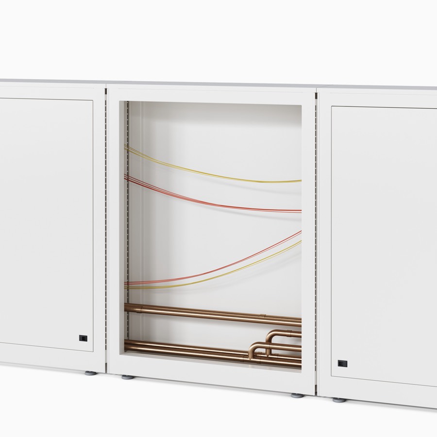 Co/Struc wall system with an open frame to show the copper piping and electrical wiring routing through the system.