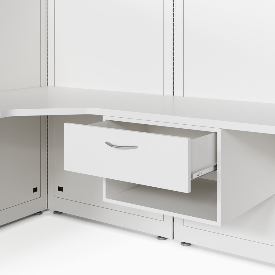 Co/Struc case drawer and storage unit attached under a work surface that's mounted to a wall frame in a soft white finish.