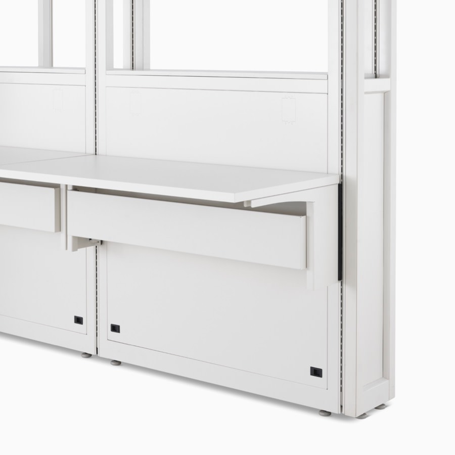 Detail of Co/Struc System in soft white finish featuring frame module with adapter rail under the work surface.