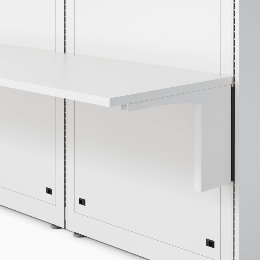 Co/Struc wall with an attached work surface and surface support in a soft white finish.