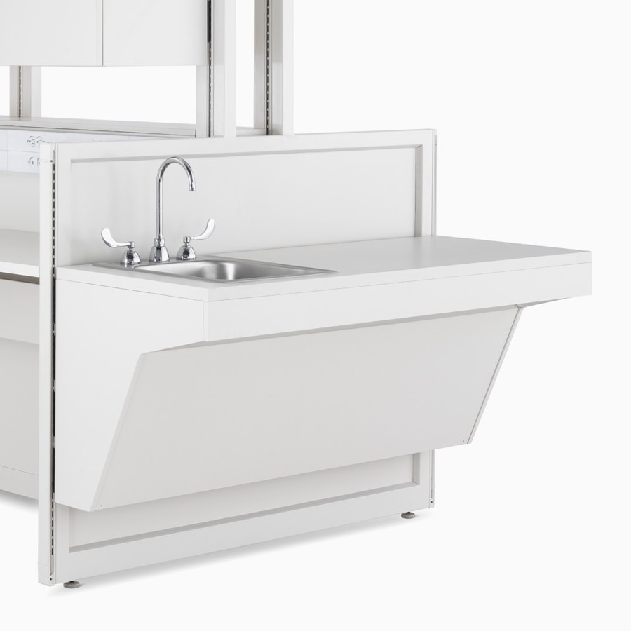 Detail of soft white Co/Struc System ADA sink hanging on a frame module.