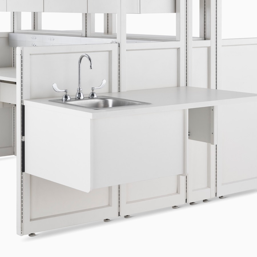 Detail of soft white Co/Struc System frame module with attached sink.