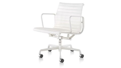 White leather Eames Aluminum Group mid-back management chair with a five-star base and powder coat frame. 