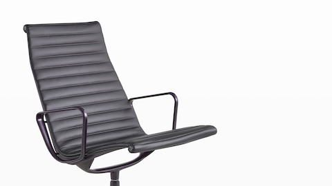 An Eames Aluminum Group Lounge Chair, viewed from the front at an angle.