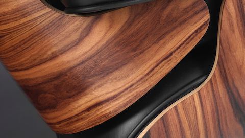 Close-up of the 7-ply veneer shell on an Eames Lounge Chair. 