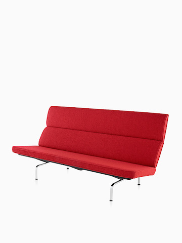 红Eames沙发紧凑。选择进入Eames Sofa Compact产品页面。