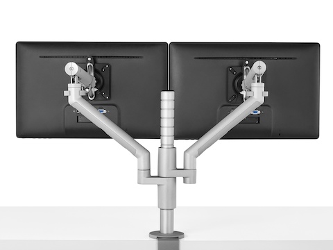 Vista posteriore di due monitor collegati a un braccio per monitor Flo Modular.
