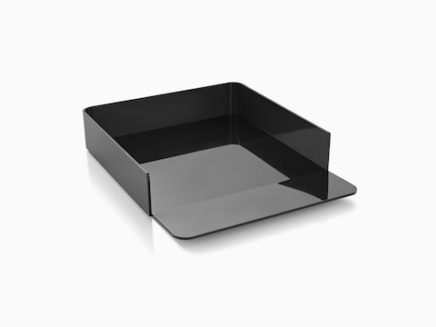 Angled view of a black Formwork Paper Tray with a gently sloped lip.