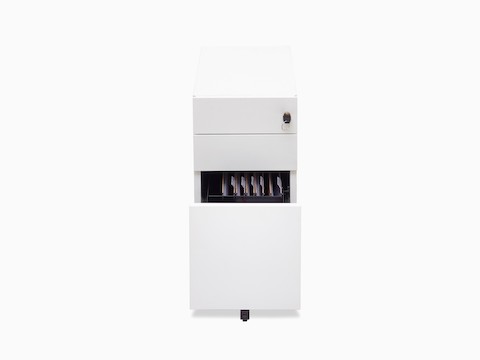 Front view of white Kumi pedestal with opened file drawer showing folders.