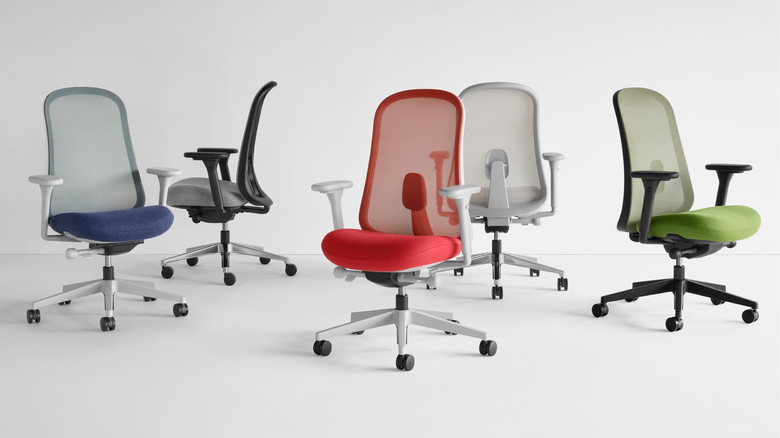 Five Lino Chairs in blue, black, gray, red and green viewed from various angles.