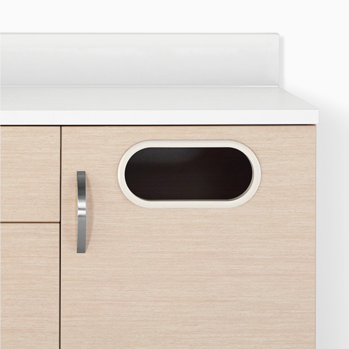 A close-up view of a Mora Systems casework trash receptacle cabinet in an ash wood finish.