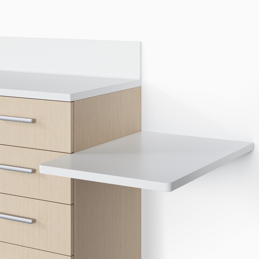 A close-up view of a Mora System casework in an ash wood finish with a seated-height side surface in white.