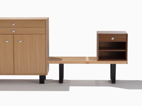 Two Nelson Basic Cabinet Series storage modules of different sizes, configurations, and finishes. 