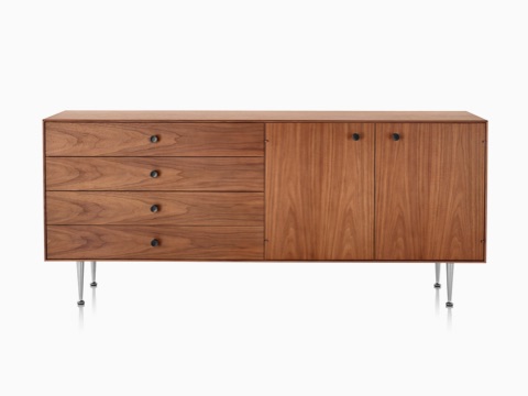 A Nelson Thin Edge chest combining four drawers and two cabinets in a medium finish. 