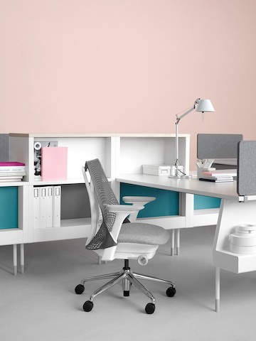 An open workstation featuring white surface and storage components from the Public Office Landscape system. 