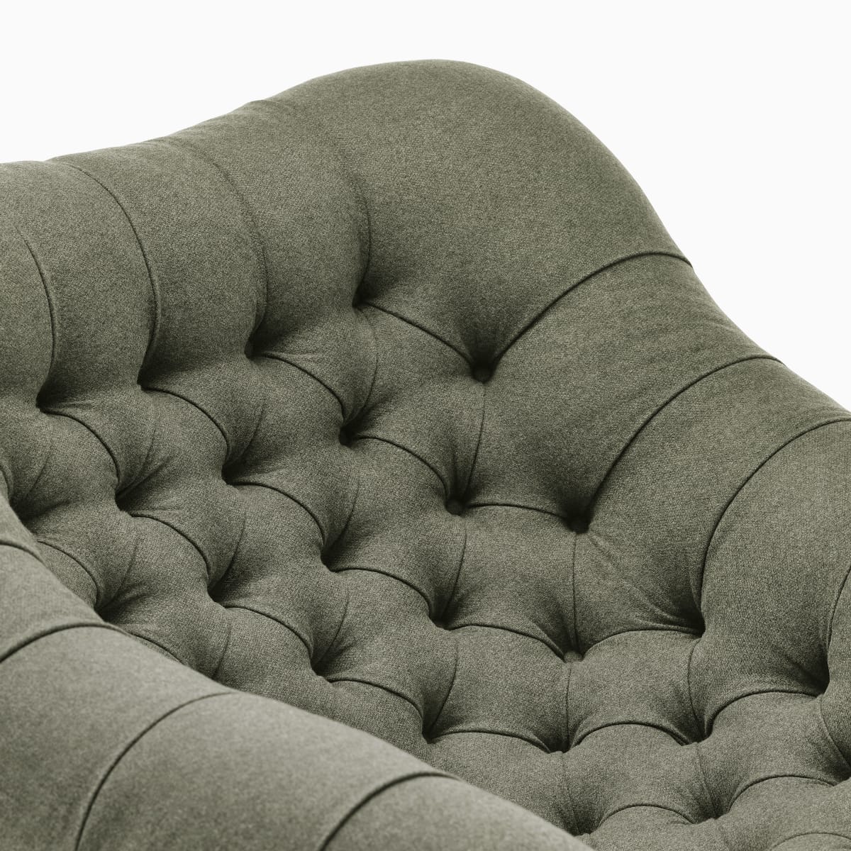 A close-up view of green fabric on a Rohde Easy Chair.
