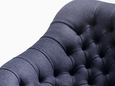 A close-up view of blue fabric on a Rohde Easy Chair.