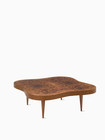 A front view of a Rohde Paldao coffee table in walnut burl.