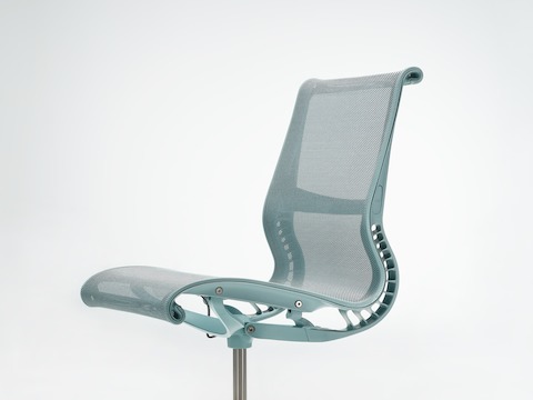 Side-angle view of a Setu Chair without arms in glacier light blue.