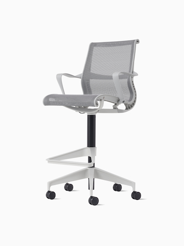 Front-angle view of a Setu Stool with fixed arms, a light gray frame, silver alloy base, and light gray suspension.