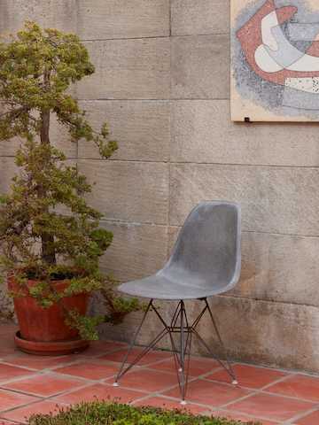 A grey Eames shell chair on Steve Cabella's patio.